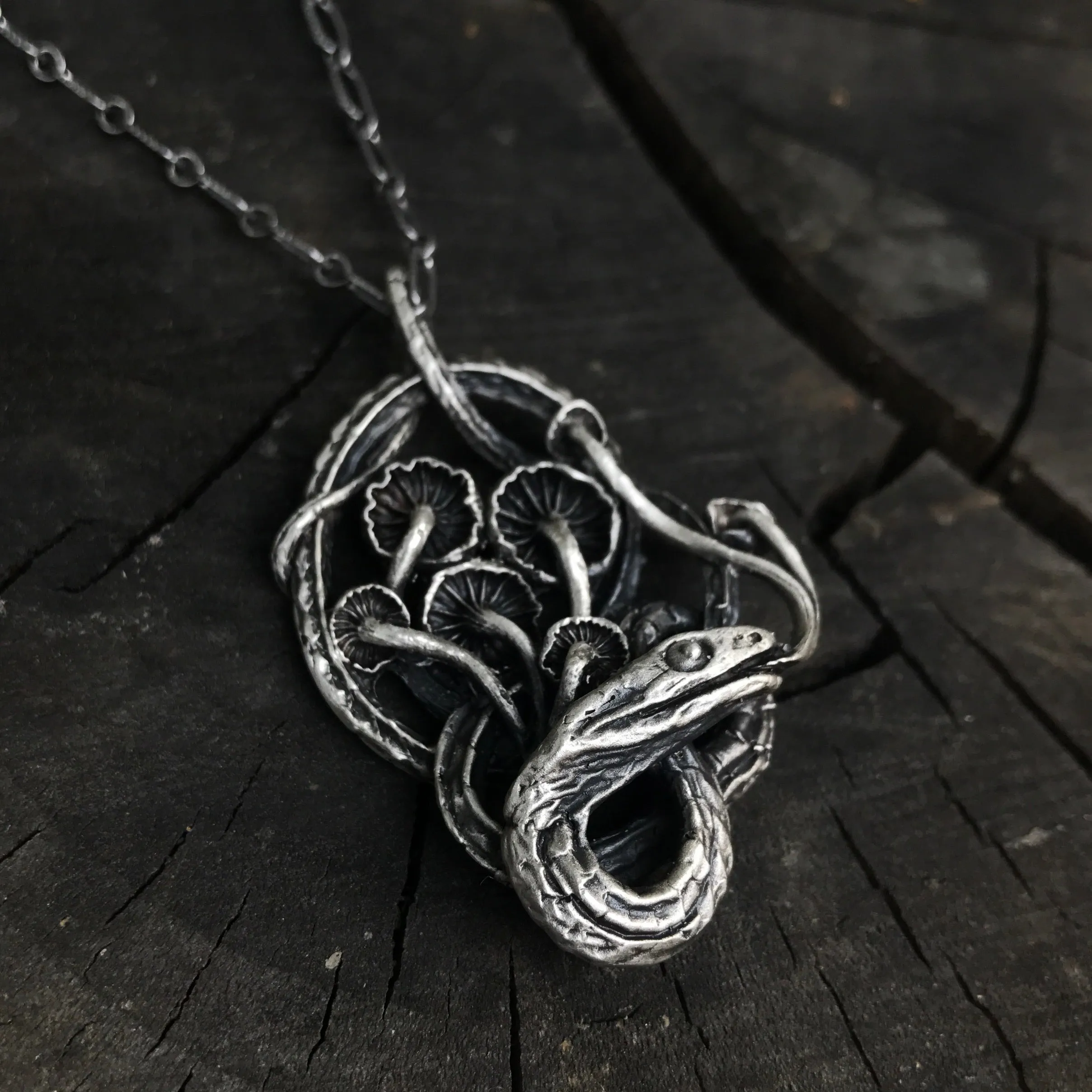 Serpent and mushrooms necklace