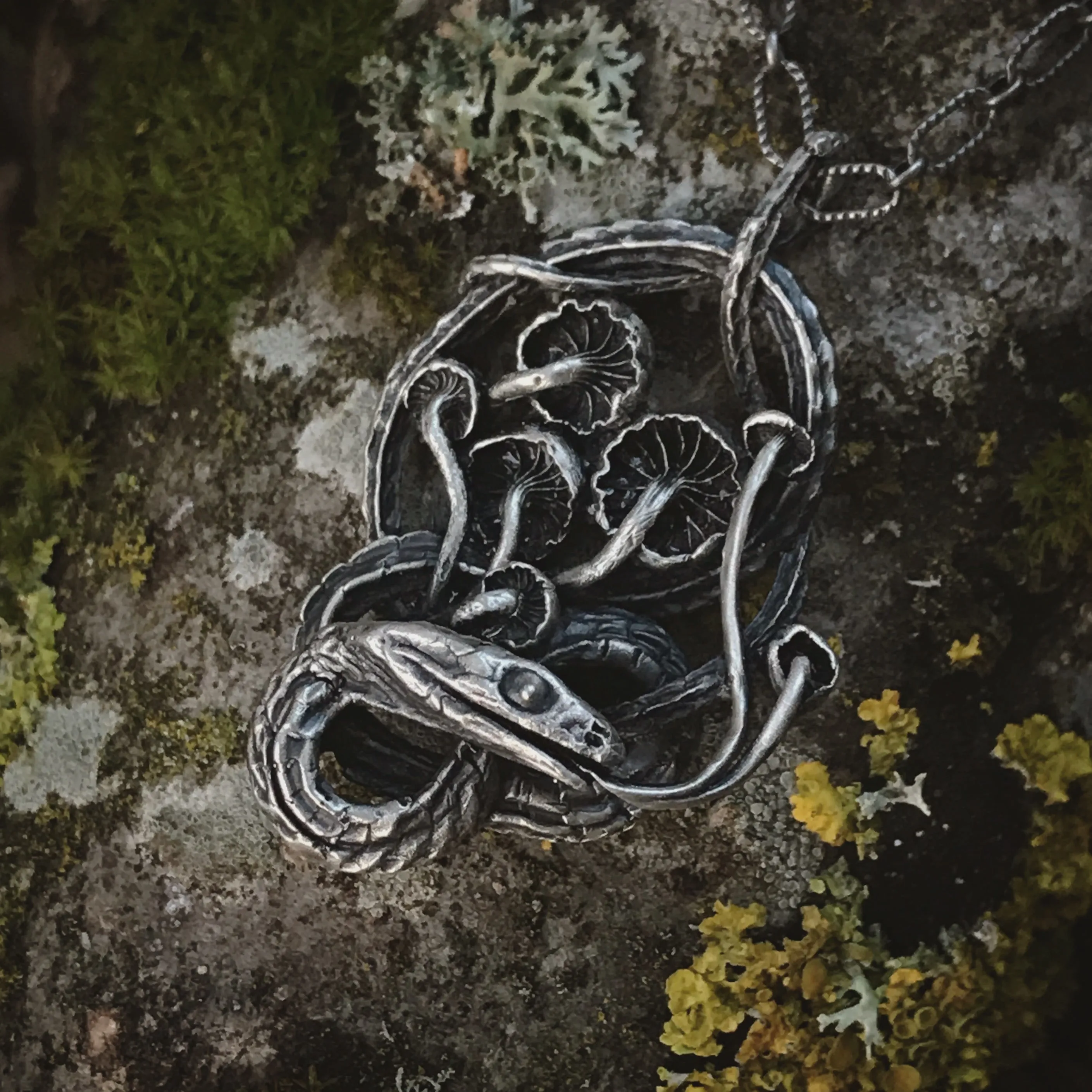 Serpent and mushrooms necklace