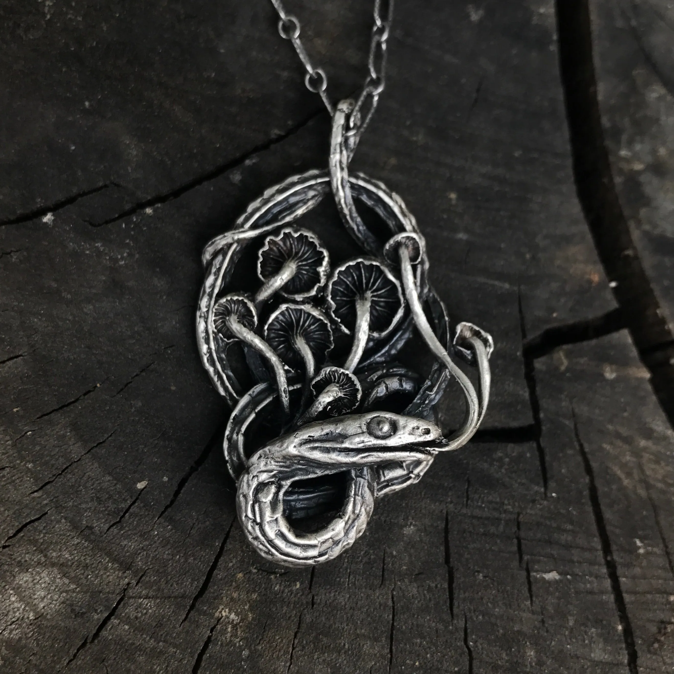 Serpent and mushrooms necklace