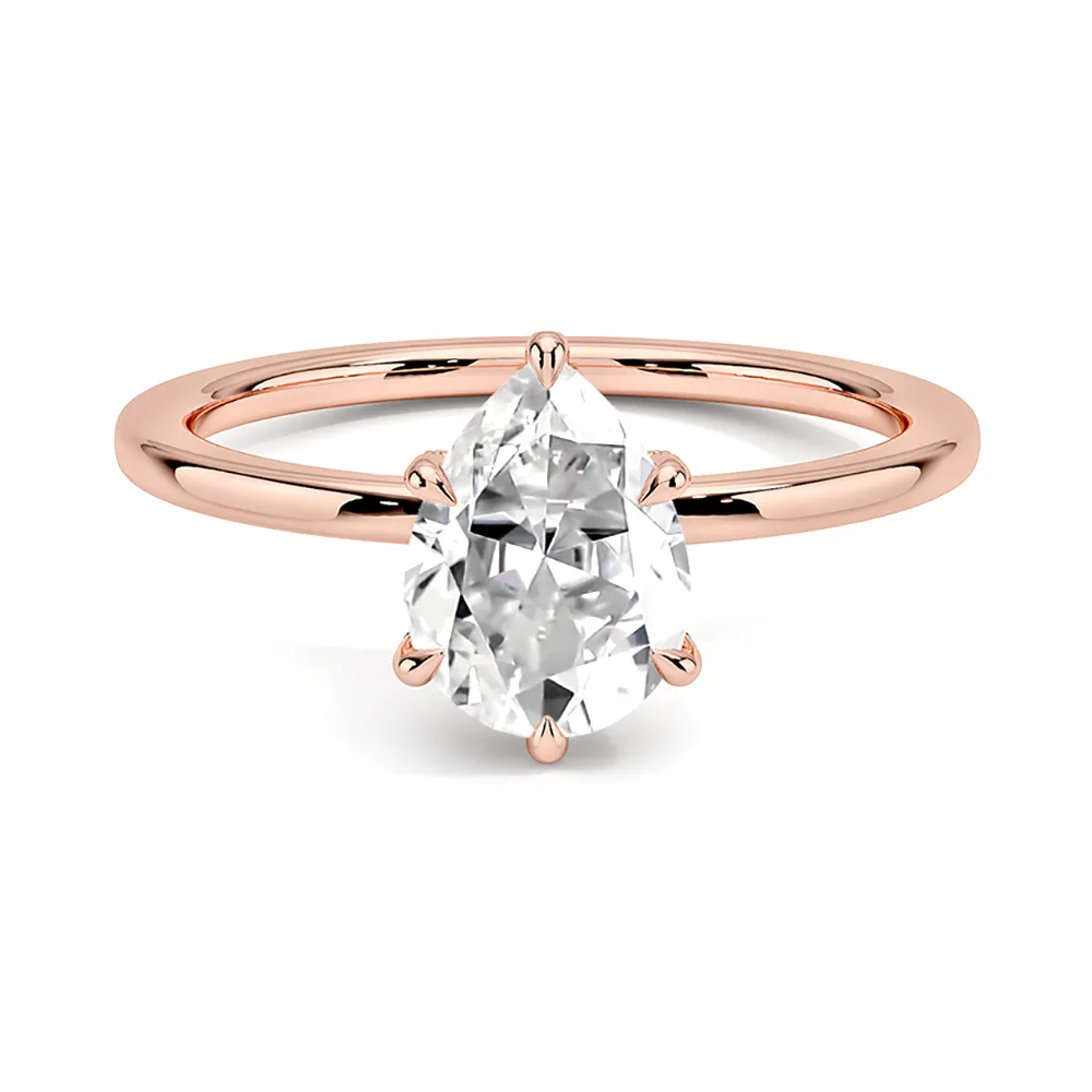 Solitaire Pear Cut Engagement Ring With Hidden Halo